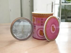 Taza mariposa rosa y dorado con filtro y tapa de 250 ml para té e infusiones naturales, diseño elegante y ritual de bienestar