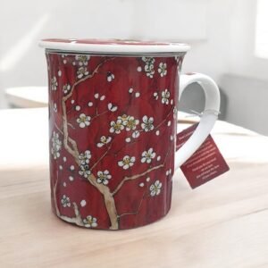taza-almendro Taza roja de cerámica con diseño de almendro en flor, con filtro interior y tapa, ideal para preparar té e infusiones a granel, capacidad 250 ml.
