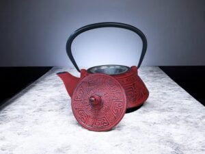 tetera-maya-roja-800l Tetera de hierro fundido estilo Maya color rojo de 0,800 litros, tetera decorativa para té e infusiones con diseño ancestral