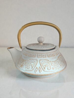 tetera-maya-blanca-mármol Tetera Maoming dorada de hierro colado 0,45 litros con filtro de acero inoxidable e interior esmaltado.