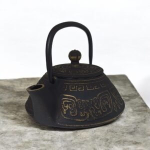 tetera-maya-dorada Tetera Maoming dorada de hierro colado 0,45 litros con filtro de acero inoxidable e interior esmaltado.